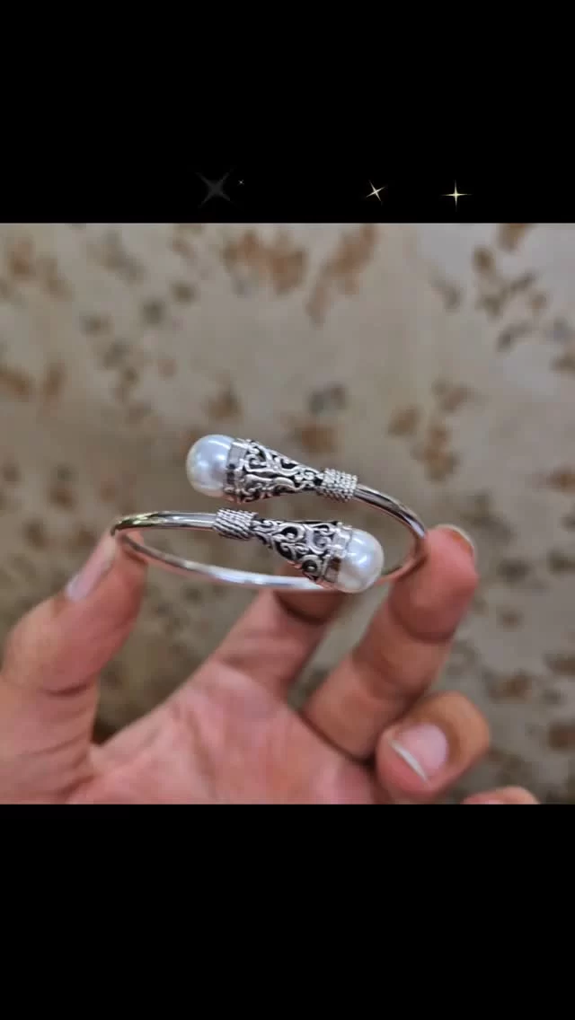Grace your wrist with timeless elegance — this pearl silver flexible bangle blends the classic charm of lustrous pearls with the modern shimmer of sterling silver. Effortlessly chic and comfortably flexible, it’s the perfect statement piece for any occasion.

#PearlBangle #SilverJewelry #ElegantStyle #TimelessBeauty #JewelryGoals #WristGameStrong #ChicAccessories #LuxuryLook #FlexibleBangle #classicwithatwist
#SilverJewelry
#SterlingSilver
#SilverStyle
#JewelryTrend
#MinimalJewelry
#EverydayGlam
#ModernJewelry
#StackedInSilver
#ShineInSilver
#TrendyAccessories
#silverbangle 
#sterlingsilver 
#silverjewelry 
#silverbracelet